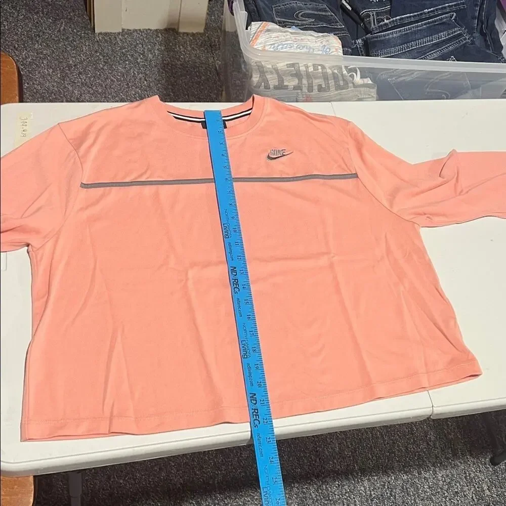 Nike women’s 1X long sleeve tee, peachy-pink with gray band